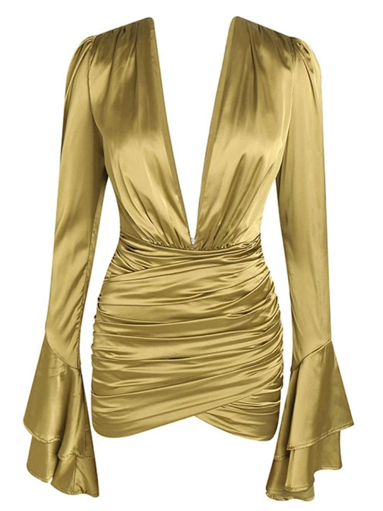 Gold satin dress with long sleeves on a white background