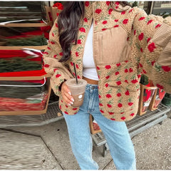 Plush fleece jacket with a vintage floral print and zip-up front.
