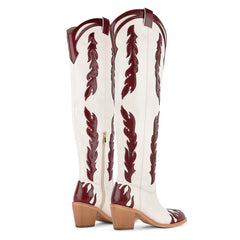 Back view of western flame embellished block heel boots