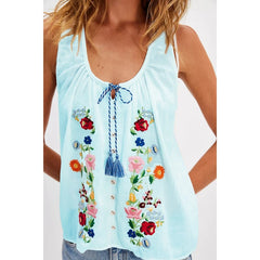 Light blue sleeveless top with colorful floral embroidery on a white background