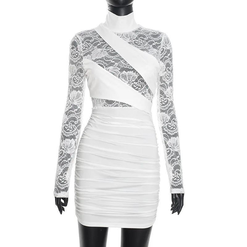 White lace dress on a mannequin against a white background