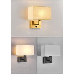 A collection of Three rectangular fabric shade wall light sconces with different colour fabric shades (white, beige, yellow,  fabric-covered) mounted on a wall.