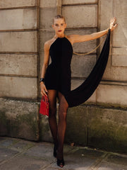 Black velvet halter dress with pleated fold detailing
