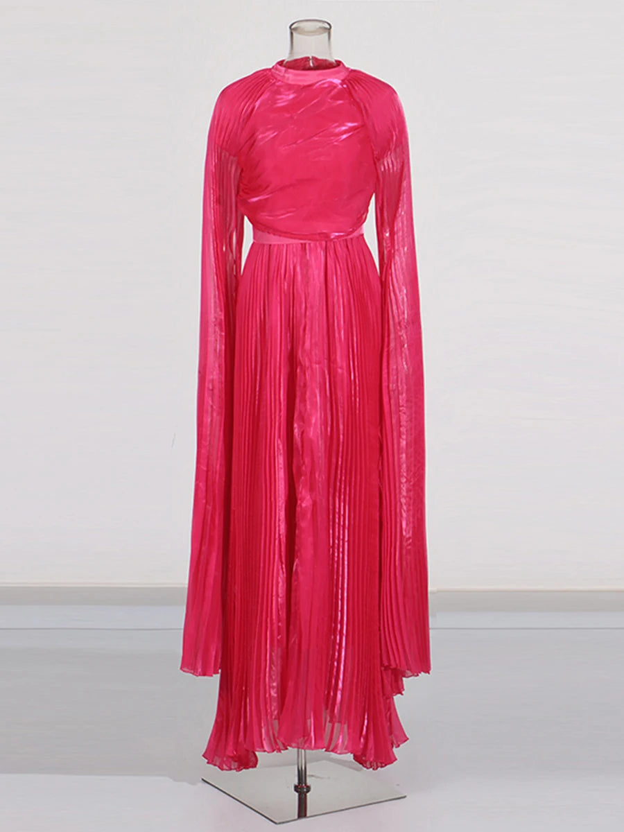 Pink pleated dress on a mannequin against a white background