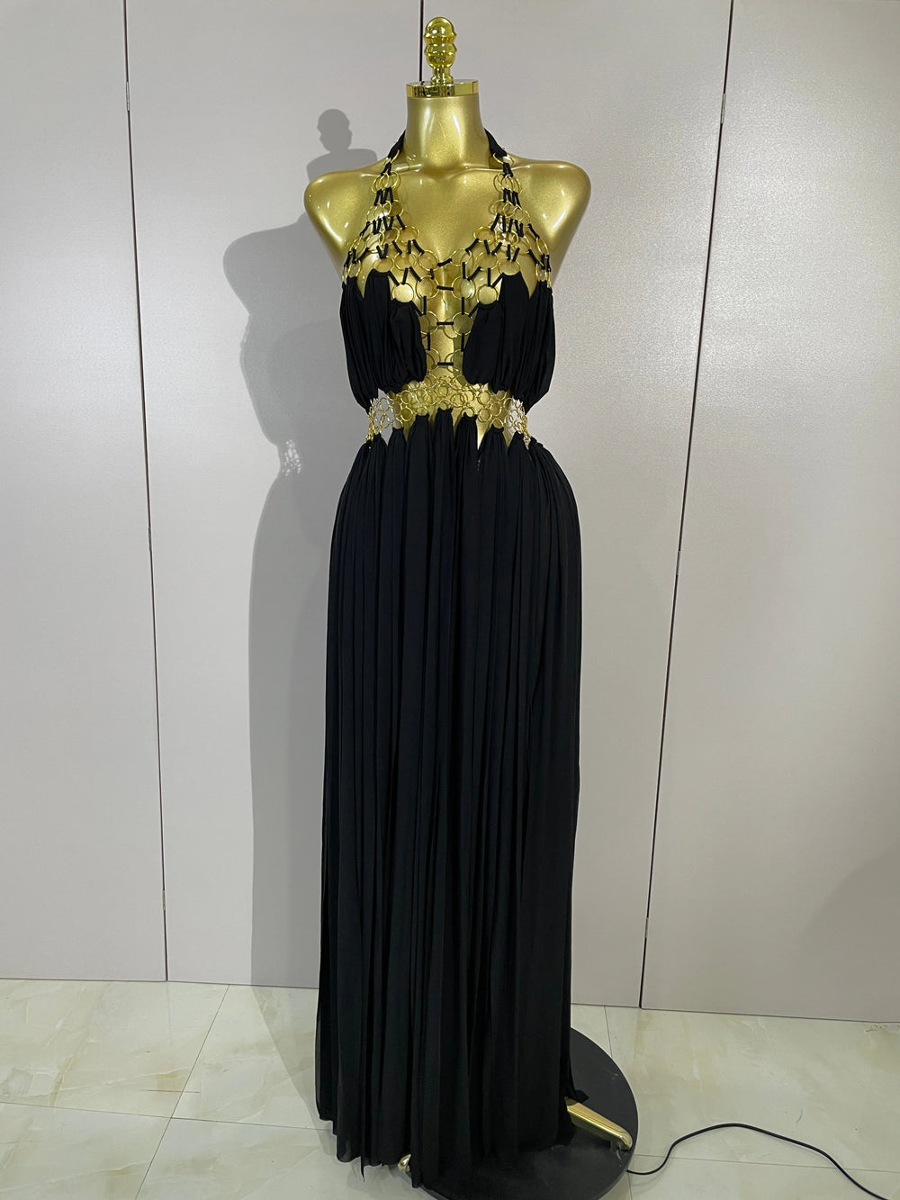 Black halter neck maxi dress with gold trim