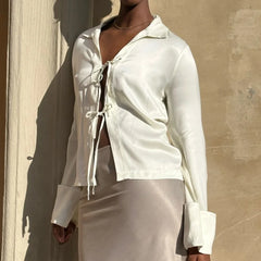 Ivory satin tie front top with cuff sleeves