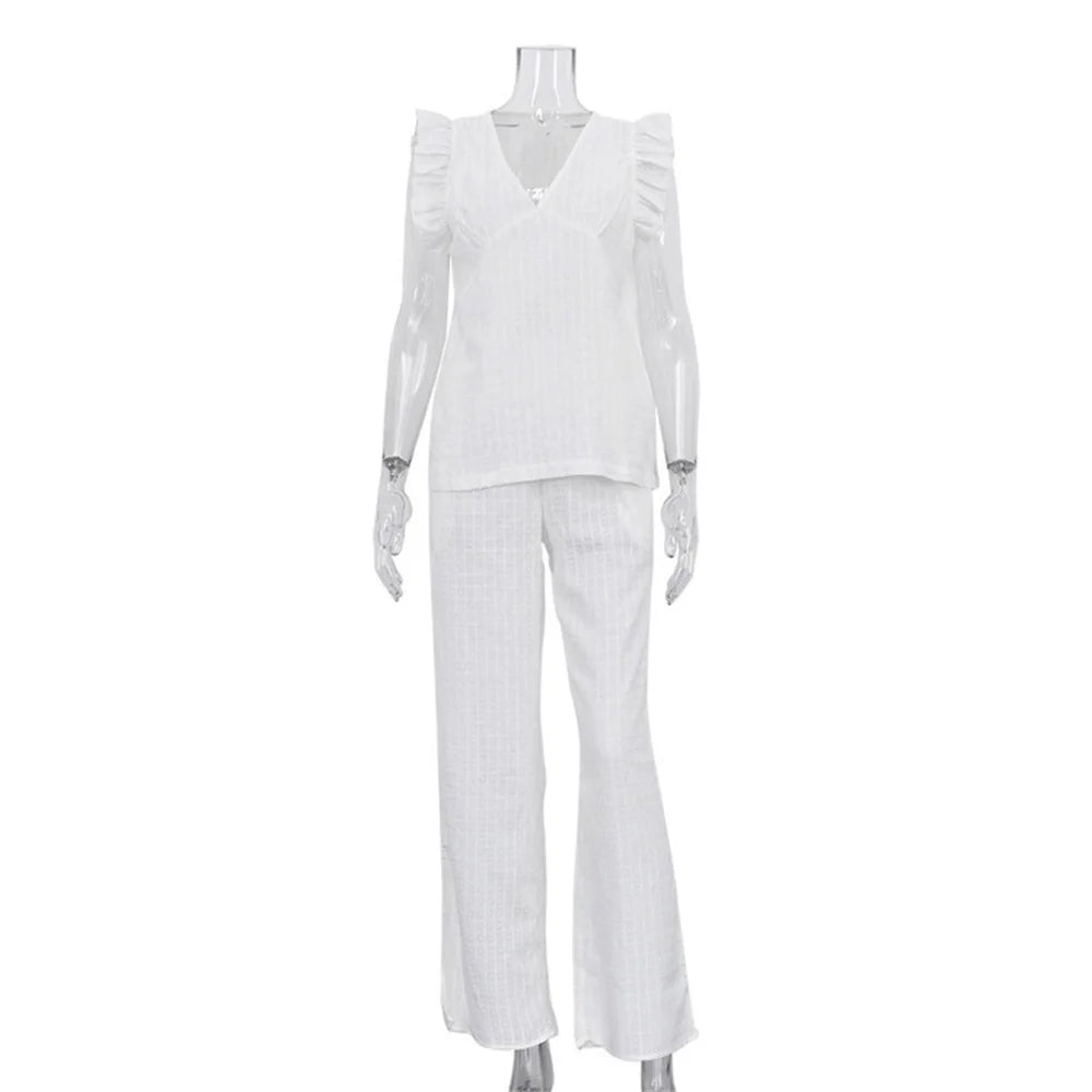 White outfit on a mannequin against a white background