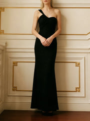 One-shoulder draped glitter midi dress, standing
