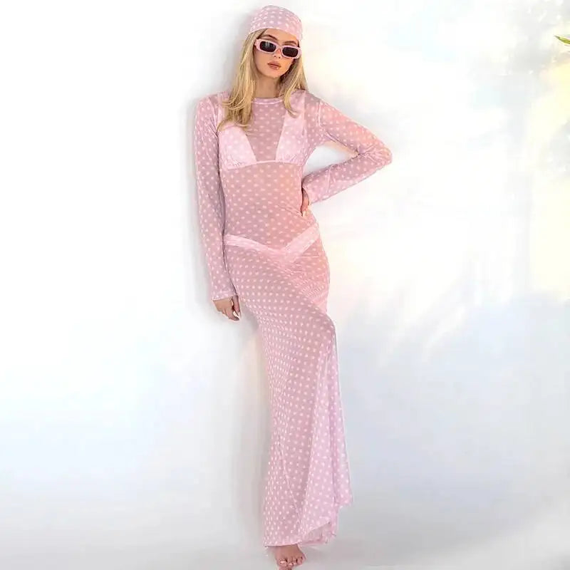 Sheer polka dot mesh maxi dress with long sleeves and sunglasses