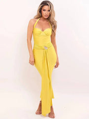 Woman wearing a yellow evening gown on a white background