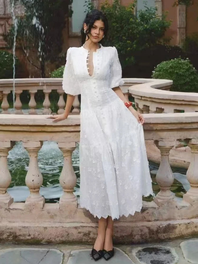White embroidered puff sleeve midi dress front view