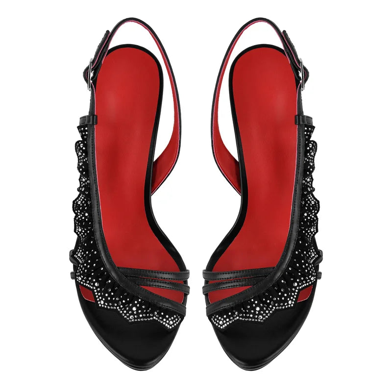 Pair of black rhinestone embellished stiletto platform sandals top view