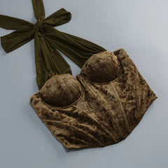 Close-up of velvet halter neck corset top with tie detail