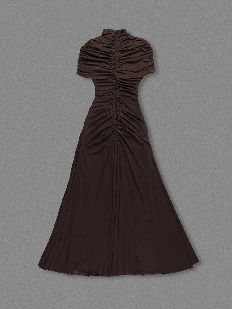 Brown evening gown on a gray background