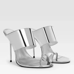 Pair of silver metallic toe ring stiletto mules