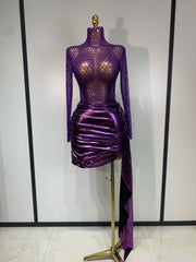 Purple long sleeve turtleneck mini dress with embellishments and draped skirt