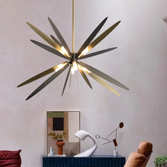 Sleek modern pendant lights hanging above a living room table, creating a sophisticated atmosphere. Golden Atelier 2