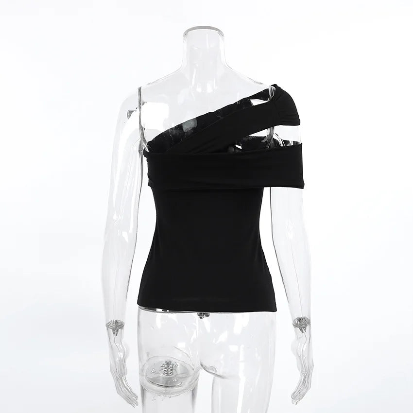 Black one-shoulder top on a transparent mannequin against a white background