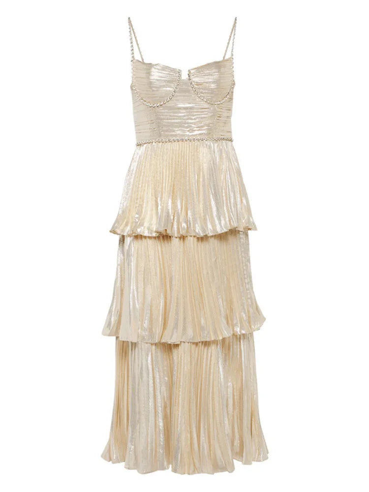 Beige tiered dress on a white background