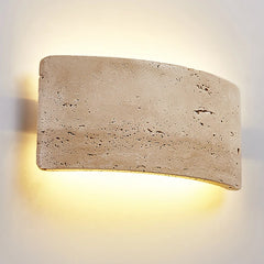 Rectangular stone wall light fixture on a plain background