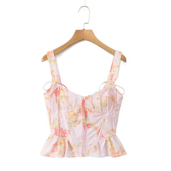 Woman wearing a Ribbon Bow Strap Ruffles Hem Top 