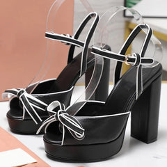 Black platform bow strap square heels