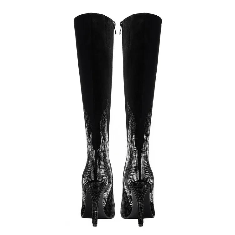Black knee-high boots with rhinestone details on a white background
