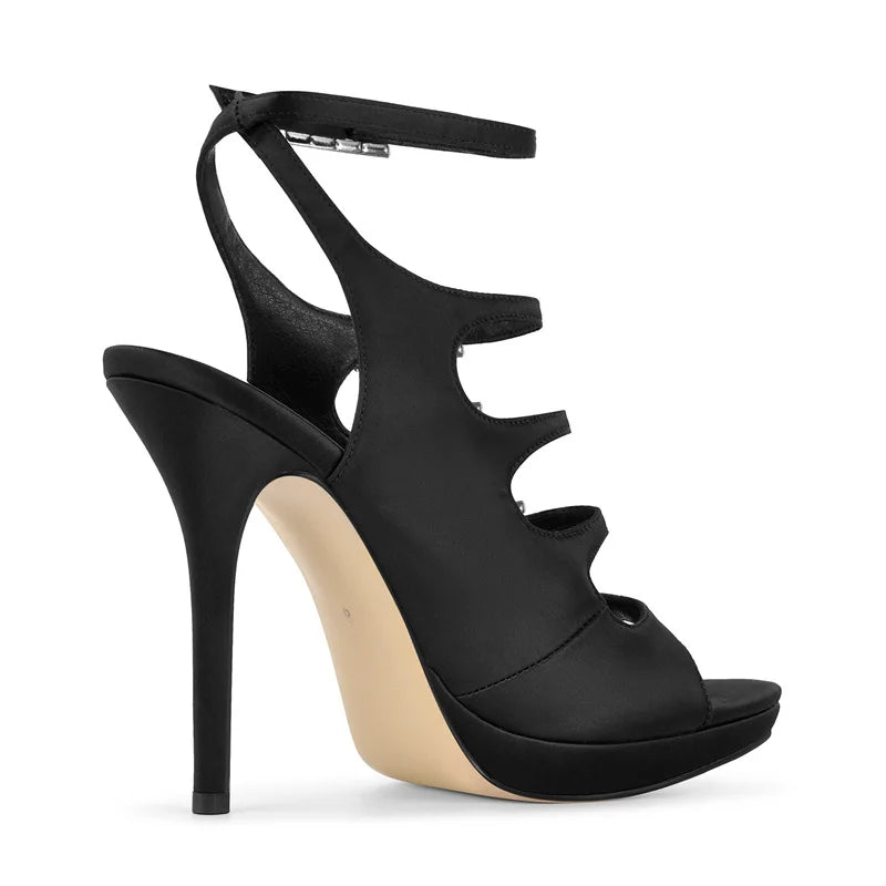 Side view of black satin multi-strap stiletto sandals