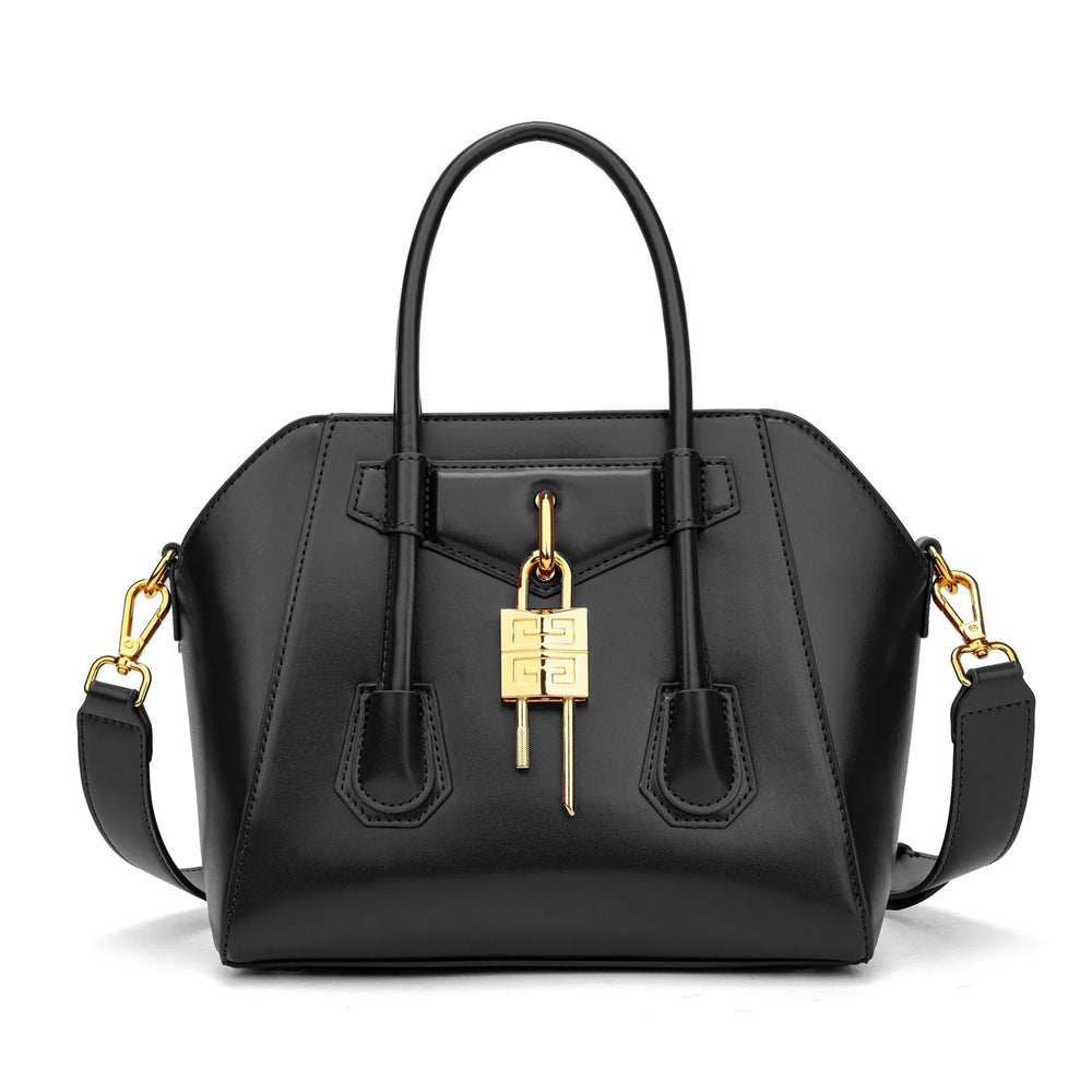Black leather structured lock bag on a white background