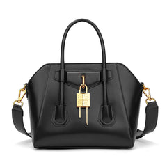 Black leather structured lock bag on a white background
