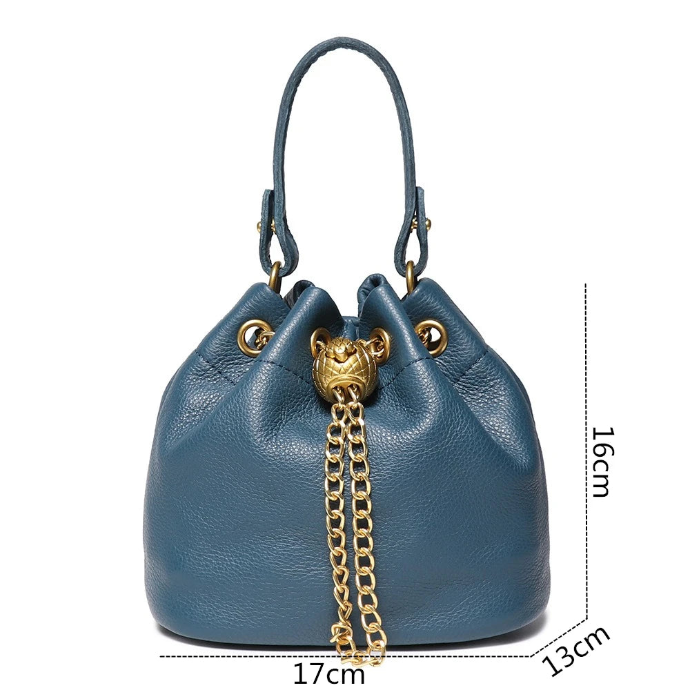 Blue leather drawstring bucket bag with dimensions