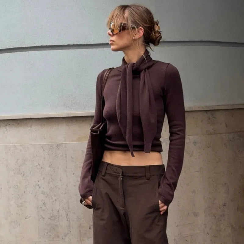 Brown knit top with scarf neck detail side view