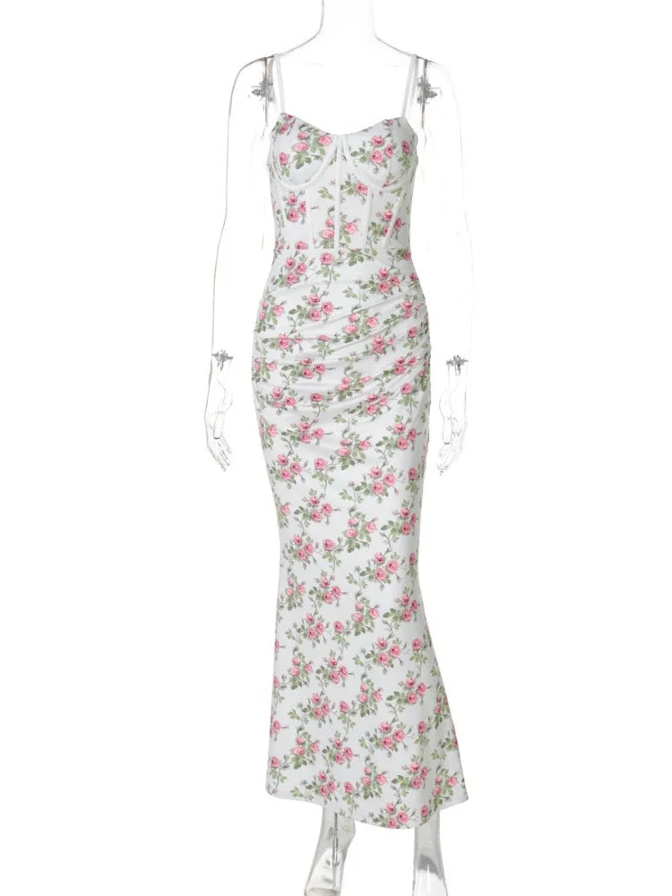 Floral dress on a mannequin against a white background