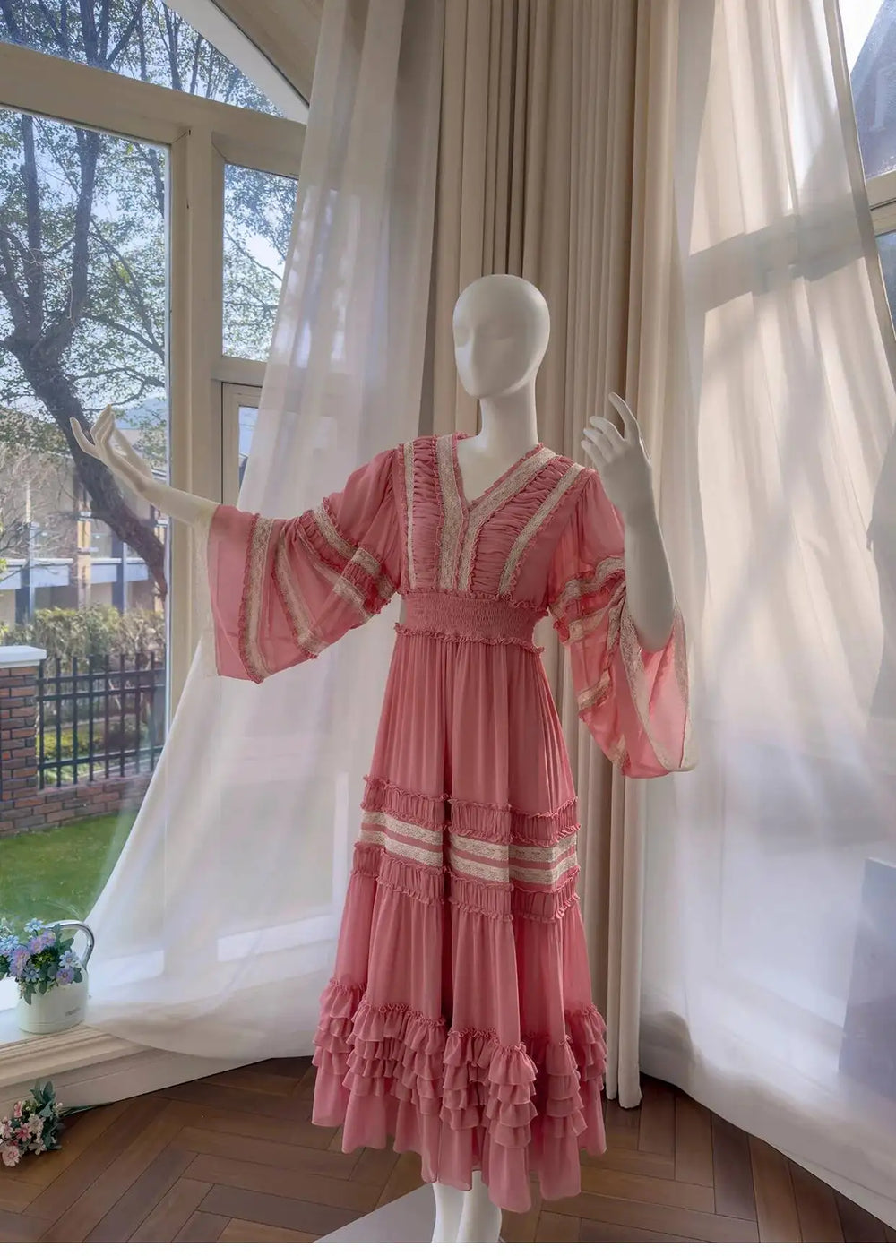 Ruffled V-Neck Chiffon Maxi Dress on a mannequin with arms extended