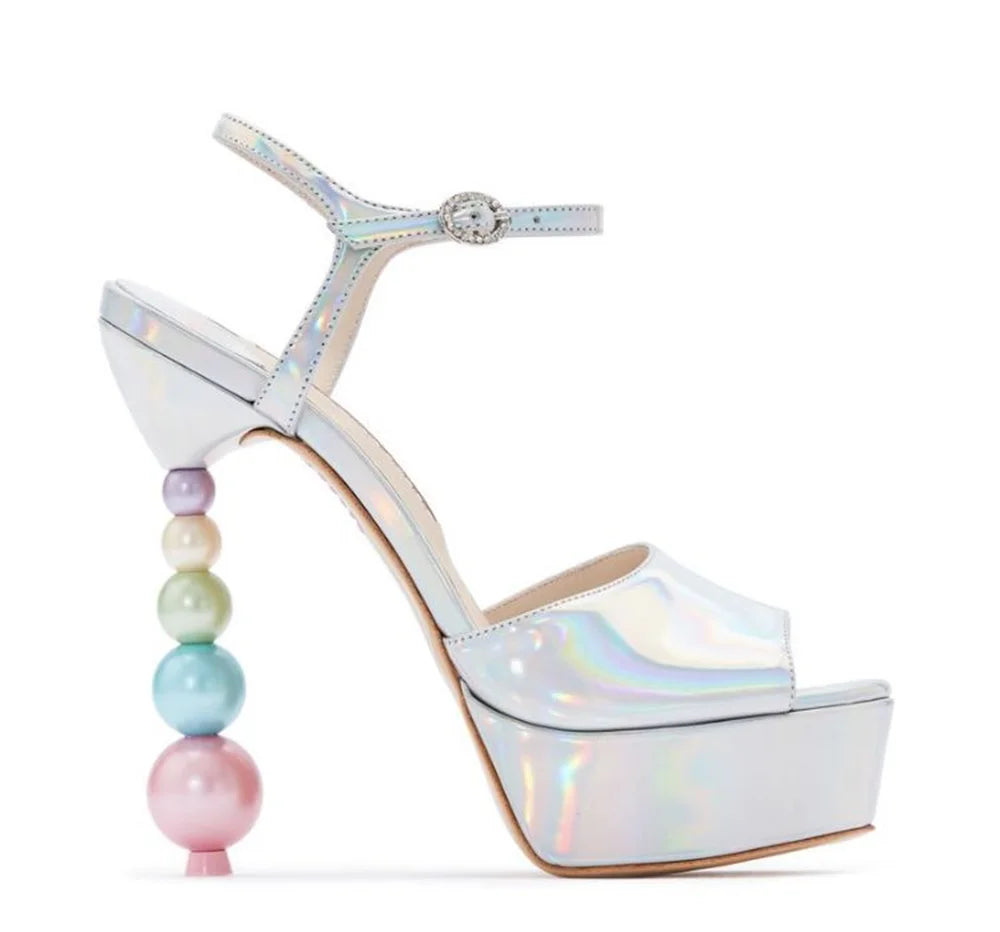 Iridescent white platform sandal with a multi-colored beaded stiletto heel.