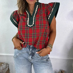 Model wearing plaid V-neck ruffle sleeve top