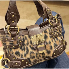 leopard print mini satchel with gold tone lock,

