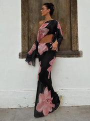Pink floral print one-shoulder crop top and flowing maxi skirt set