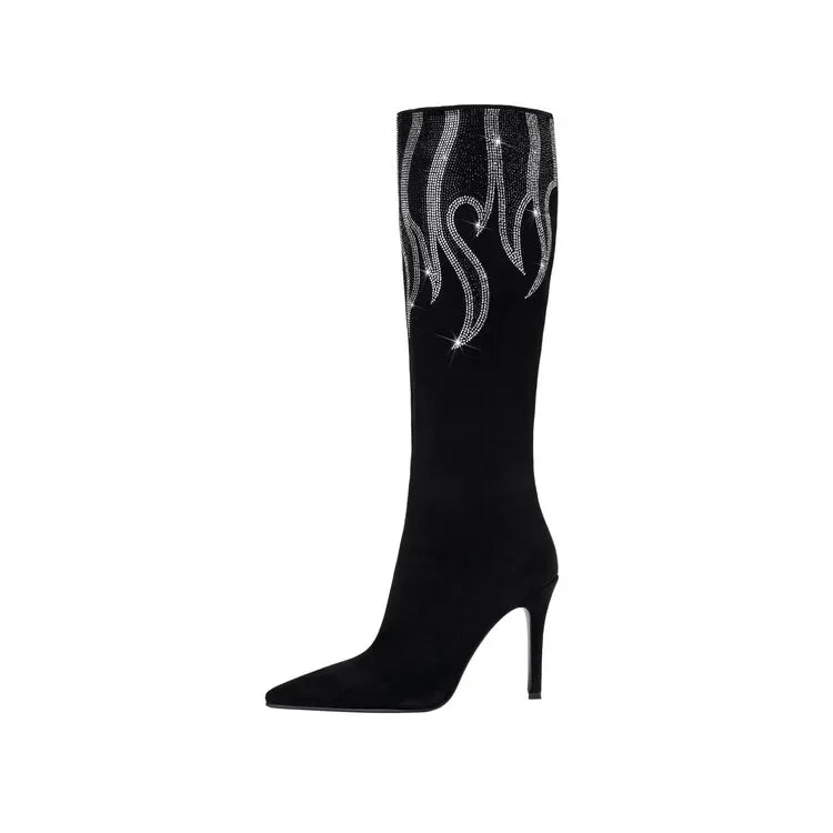 Black knee-high boot with silver flame design on a white background