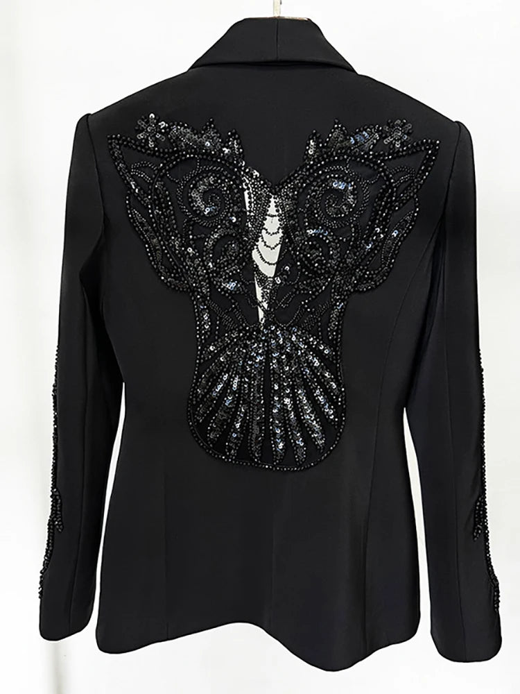 Black blazer with butterfly sequin design on the back against a white background
