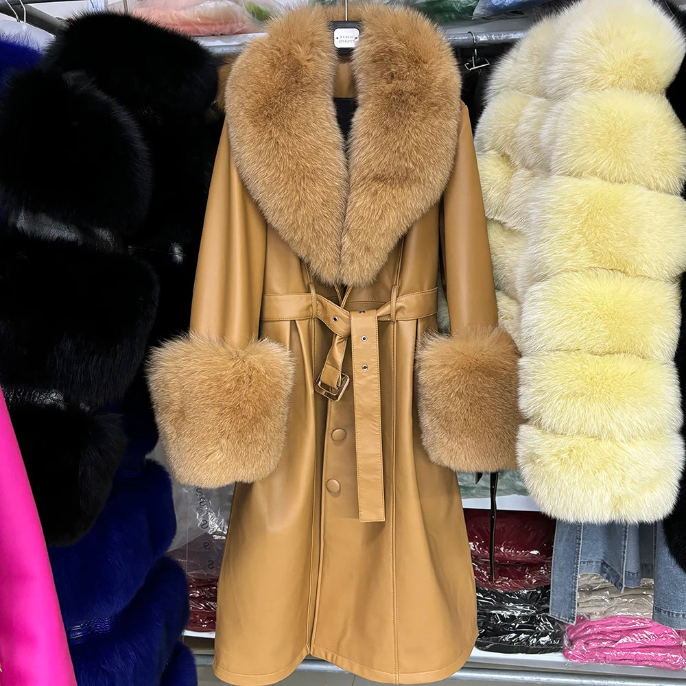 Tan coat with fur collar and cuffs displayed in a store setting