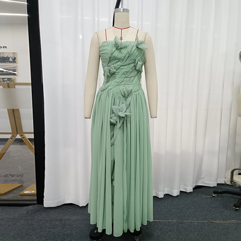 Strapless ruffled floral applique gown on mannequin