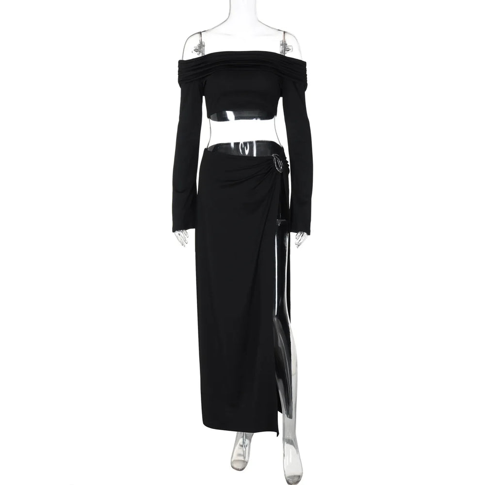Black off-shoulder top and long skirt set on a mannequin against a white background