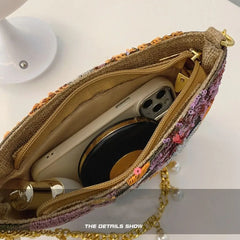 A close-up of the clutch bag with inner content store capacity.