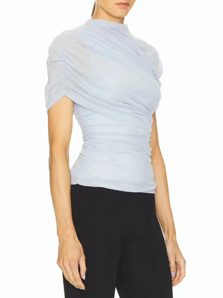 Side view of draped mock neck short sleeve top