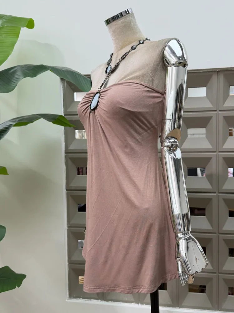 Side view of strapless ruched mini dress with gemstone accent