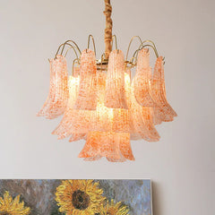  Chandelier emitting a warm, romantic glow, creating an inviting atmosphere in the room. Golden Atelier 4