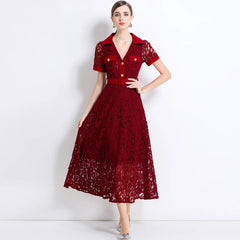 Red lace dress with short sleeves and buttons on a white background