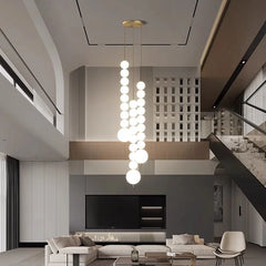 Warm light emanating from a Nordic-style pendant light fixture, highlighting its cozy aesthetic. Golden Atelier 3Nordic home decor dining room Pendant lamp lights indoor lighting Ceiling lamp hanging light chandelier lamps for living room Golden Atelier