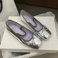Silver square toe ballet flats with a bow and crystal embellishment